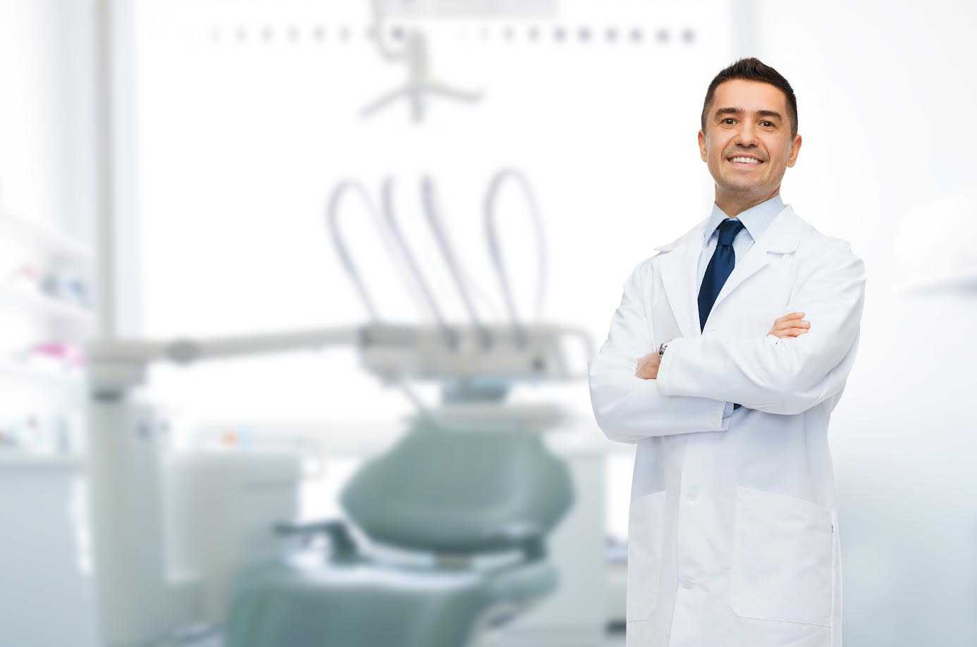 Male Dentist in White Coat at Dental Clinic | Smile Virtual