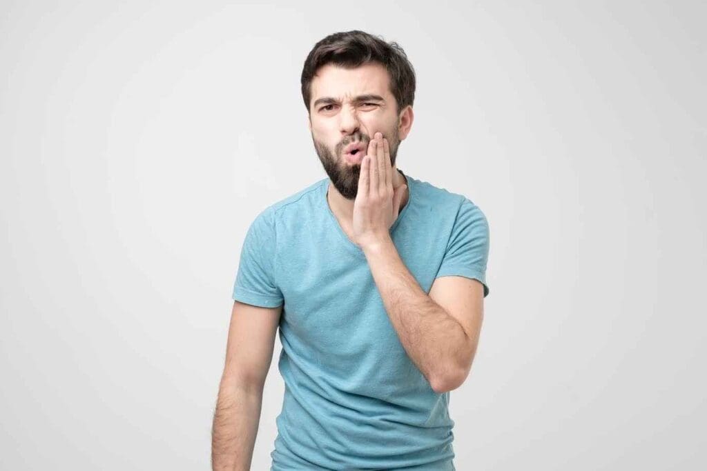 Man Showing Sensitivity on his Teeth | Smile Virtual