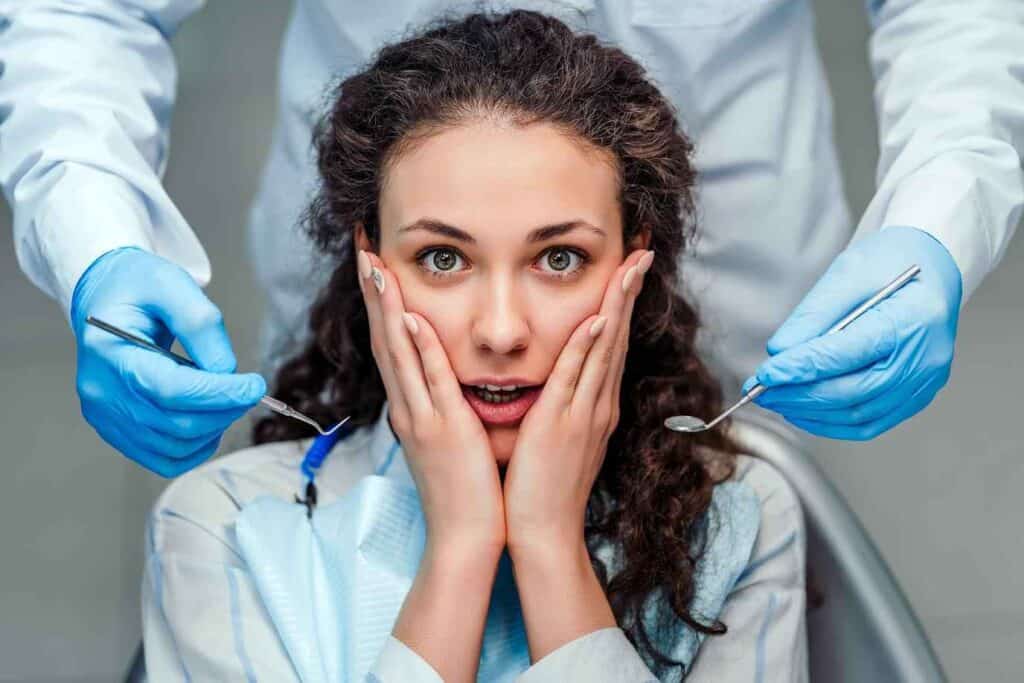 Female Showing Dental Anxiety During Treatment | Smile Virtual