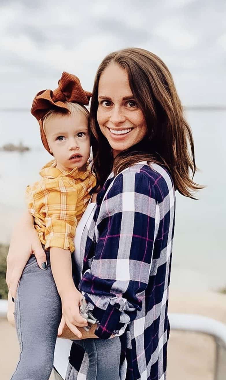 Woman Holding Baby with Perfect Smile | Smile Virtual